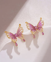Elegantes pendientes de mariposa con esmalte dorado en plata de ley morada