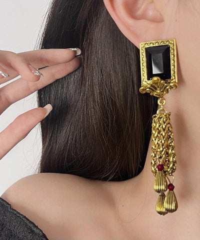 Pendientes retro de plata de ley negra con gemas doradas y borlas con cadena  Pendientes retro de plata de ley negra con gemas doradas y borlas con cadena