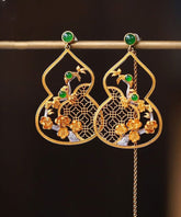 Elegantes pendientes colgantes florales ahuecados con jade dorado y plata esterlina dorada