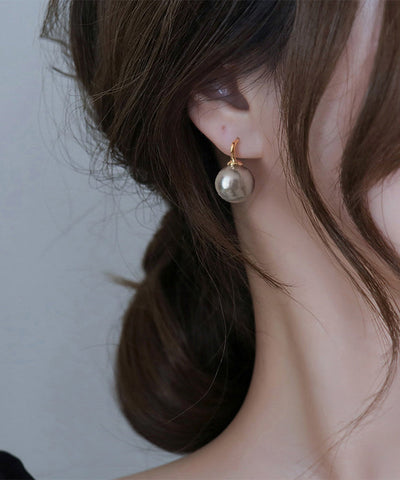 Pendientes de perla con sobredorado de cobre dorado de moda  Pendientes de perla con sobredorado de cobre dorado de moda