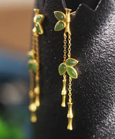 Pendientes colgantes de bambú dorados en plata de ley verde moderna