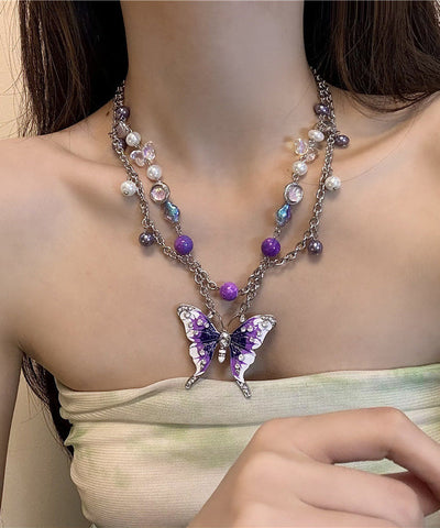 Collar de lazo con borla hueca y mariposa de circonita y cristal de acero inoxidable morado a la moda  Collar de lazo con borla hueca y mariposa de circonita y cristal de acero inoxidable morado a la moda
