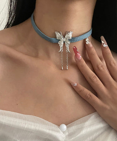 Collar con colgante de borla de mariposa y cuerda de cuero de aleación azul de moda  Collar con colgante de borla de mariposa y cuerda de cuero de aleación azul de moda