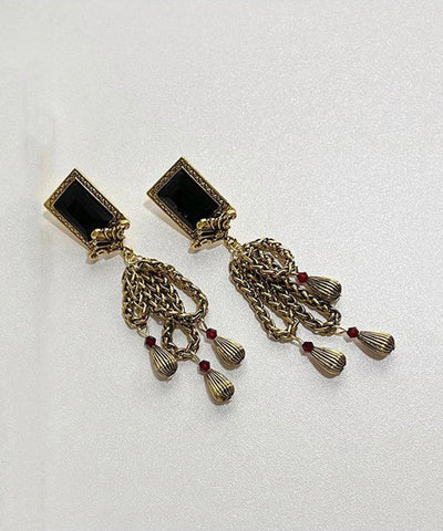 Pendientes retro de plata de ley negra con gemas doradas y borlas con cadena  Pendientes retro de plata de ley negra con gemas doradas y borlas con cadena