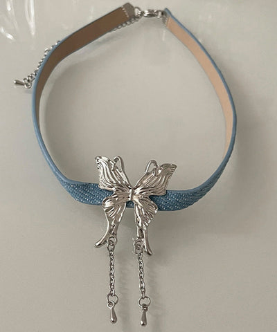 Collar con colgante de borla de mariposa y cuerda de cuero de aleación azul de moda  Collar con colgante de borla de mariposa y cuerda de cuero de aleación azul de moda