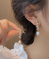 Pendientes modernos de perla de aleación de cobre y oro