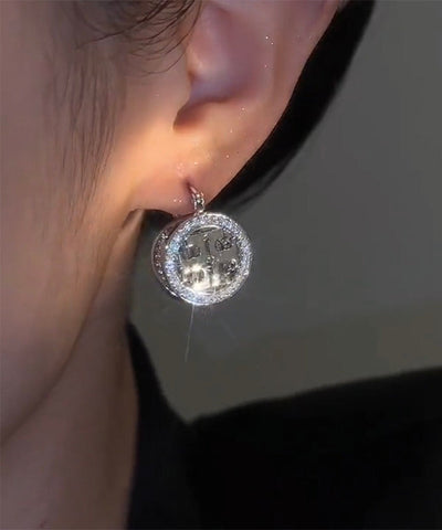 Pendientes modernos de seda con círculos de circonitas  Pendientes modernos de seda con círculos de circonitas