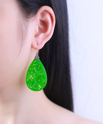 Pendientes colgantes de jade Tocantins con detalles calados en plata de ley dorada retro  Pendientes colgantes de jade Tocantins con detalles calados en plata de ley dorada retro