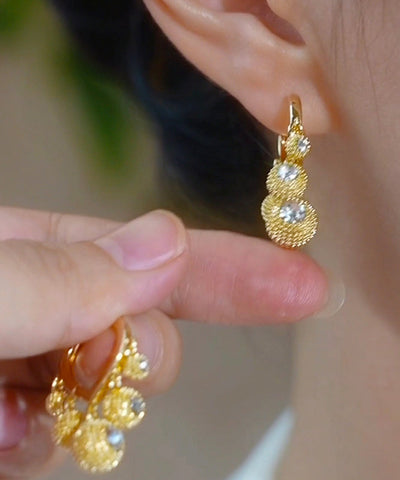 Pendientes de aro de durian con circonitas y aleación de cobre y oro de moda  Pendientes de aro de durian con circonitas y aleación de cobre y oro de moda