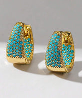 Pendientes de aro de plata de ley verde con circonitas turquesas doradas