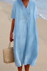 Meridress – Baggy-Midikleid aus Baumwollleinen mit V-Ausschnitt und kurzen Ärmeln