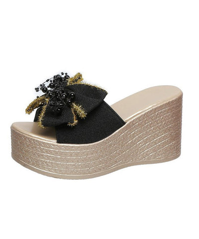 Schwarze Sandalen mit Keilabsatz und Schleife und Peep Toe  Schwarze Sandalen mit Keilabsatz und Schleife und Peep Toe