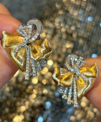 Loose Gold 14K Zircon Bow Stud Earrings Loose Gold 14K Zircon Bow Stud Earrings