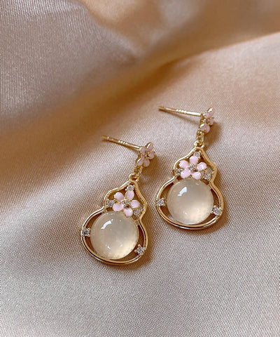 Pendientes colgantes de calabaza con diseño floral de aleación de cobre y oro de moda  Pendientes colgantes de calabaza con diseño floral de aleación de cobre y oro de moda