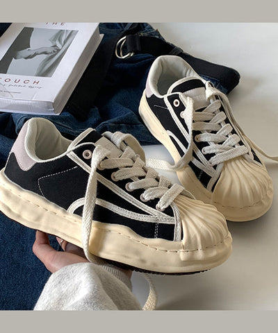 Zapatos planos casuales de plataforma negra con cordones  Zapatos planos casuales de plataforma negra con cordones