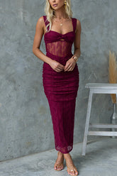 Meridress – Ärmelloses, figurbetontes Maxikleid mit verdrehter Vorderseite, Cut-Out und Rüschen