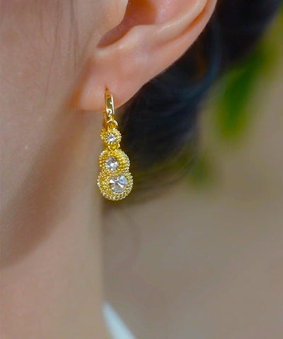 Pendientes de aro de durian con circonitas y aleación de cobre y oro de moda  Pendientes de aro de durian con circonitas y aleación de cobre y oro de moda