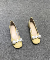 Schicke, bequeme Ballerinas mit Schleife in Gelb aus Rindsleder