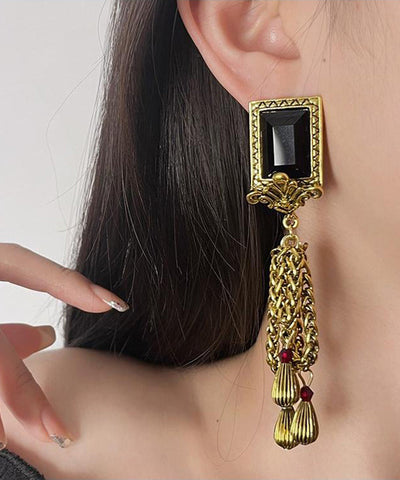 Pendientes retro de plata de ley negra con gemas doradas y borlas con cadena  Pendientes retro de plata de ley negra con gemas doradas y borlas con cadena