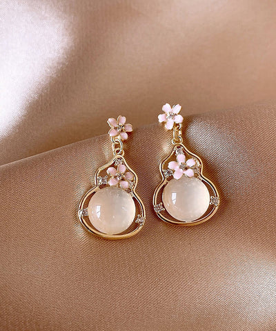 Pendientes colgantes de calabaza con diseño floral de aleación de cobre y oro de moda  Pendientes colgantes de calabaza con diseño floral de aleación de cobre y oro de moda