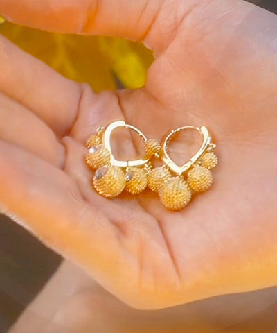 Pendientes de aro de durian con circonitas y aleación de cobre y oro de moda  Pendientes de aro de durian con circonitas y aleación de cobre y oro de moda