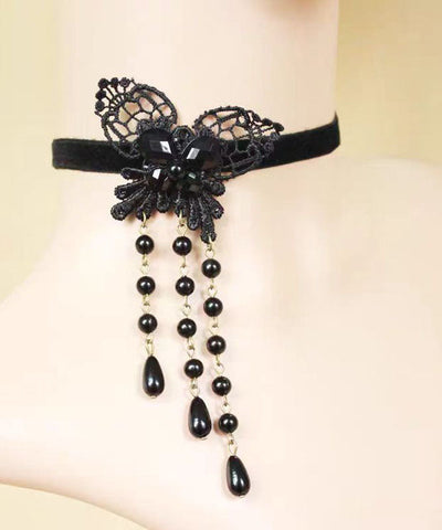 Collar con colgante de borla de perla y mariposa de encaje de aleación de cobre negro de moda  Collar con colgante de borla de perla y mariposa de encaje de aleación de cobre negro de moda