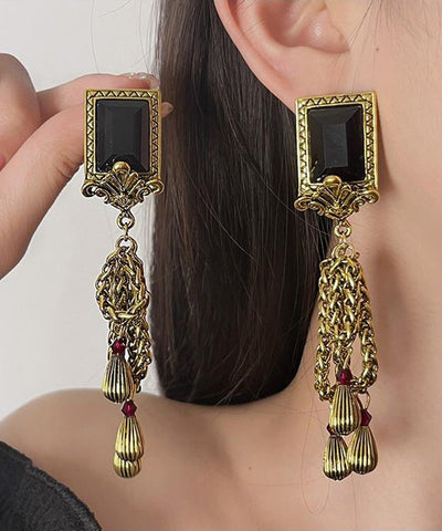 Pendientes retro de plata de ley negra con gemas doradas y borlas con cadena  Pendientes retro de plata de ley negra con gemas doradas y borlas con cadena