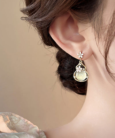Pendientes colgantes de calabaza con diseño floral de aleación de cobre y oro de moda  Pendientes colgantes de calabaza con diseño floral de aleación de cobre y oro de moda