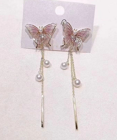 Ohrringe mit Schmetterlingsperlen und Quaste in Blau mit Farbverlauf  Ohrringe mit Schmetterlingsperlen und Quaste in Blau mit Farbverlauf