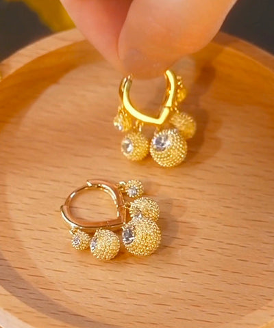 Pendientes de aro de durian con circonitas y aleación de cobre y oro de moda  Pendientes de aro de durian con circonitas y aleación de cobre y oro de moda