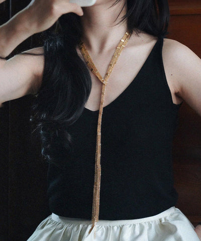 Collar con colgante de borla multicapa de cobre dorado a la moda  Collar con colgante de borla multicapa de cobre dorado a la moda