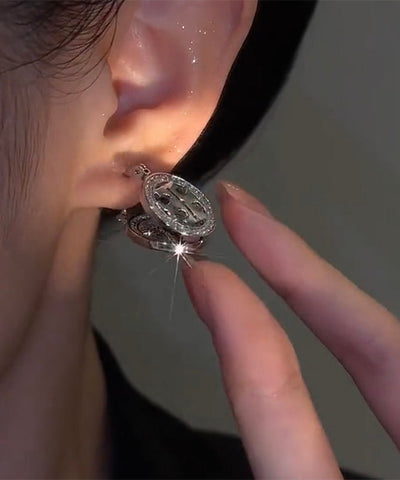 Pendientes modernos de seda con círculos de circonitas  Pendientes modernos de seda con círculos de circonitas