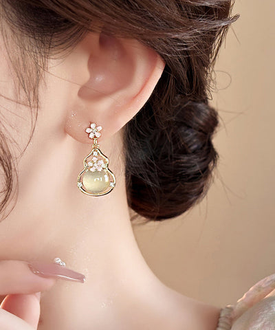 Pendientes colgantes de calabaza con diseño floral de aleación de cobre y oro de moda  Pendientes colgantes de calabaza con diseño floral de aleación de cobre y oro de moda