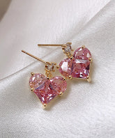 Elegantes pendientes de botón con cristales de amor de aleación de cobre rosa
