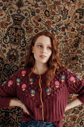 Cárdigan de punto con cuello redondo y manga larga con estampado floral