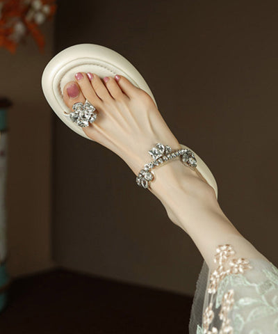 Sandalias tipo chanclas gruesas con diseño de circonitas amarillas  Sandalias tipo chanclas gruesas con diseño de circonitas amarillas