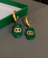 Pendientes de aro geométricos asimétricos de aleación de cobre verde artístico