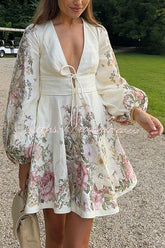 Vestido mini con bolsillos, mangas abullonadas y estampado único de flores Gala en mezcla de lino