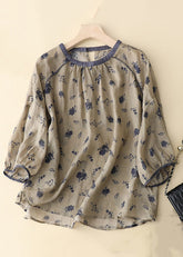 Camiseta holgada de algodón con botones y estampado caqui, mangas con pulsera