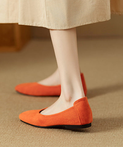 Mocasines planos sencillos y cómodos de ante naranja 