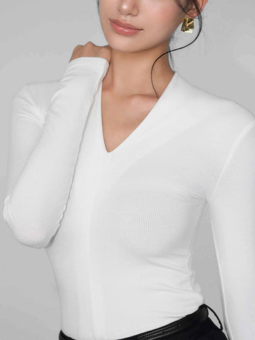 Camiseta de jersey ajustada con cuello en V 