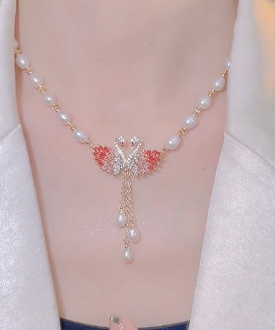 Collar con colgante de perla de cisne con sobredorado de cobre morado claro de moda 