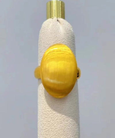 Anillos modernos en forma de huevo de paloma de oro amarillo de 14 quilates 