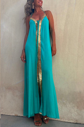 Vestido largo camisola Meridress con escote en V, espalda descubierta y lentejuelas con aberturas detalladas