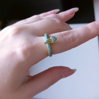 "Zirconia Love Knot: Heart Charm Rings"