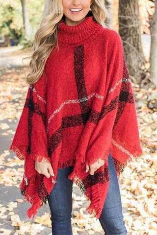 Suéter poncho con borlas y entramado más chic de Meridress