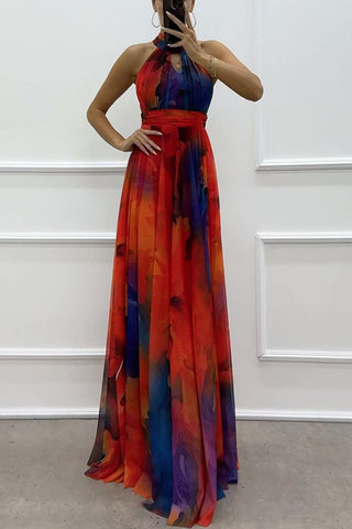 Vestido largo con cuello halter, abertura y estampado floral de tul rosa 