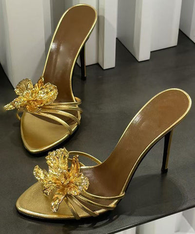 Schwarze Stiletto-Sandalen aus Kunstleder mit Blumenmuster 