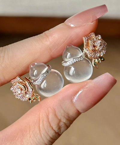 Pendientes de botón florales de calabaza, calcedonia y circonita de aleación color nude.