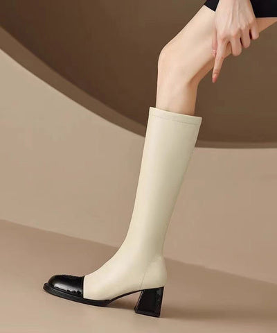 Schicke beige Stiefel aus Rindsleder mit Spleiß und klobigem Absatz 